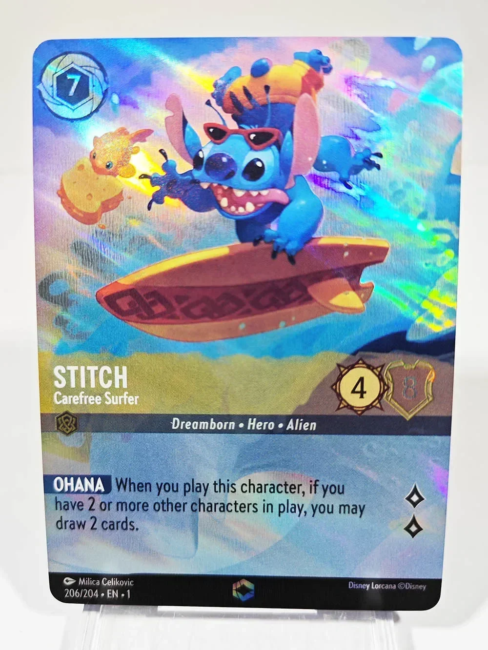 디즈니 로르카나 프록시 영어 호일 TCG 게임 카드, 고품질 엘사 미키 마우스 벨 오로라 알라딘 지니 스티치 팅커 벨 title=디즈니 로르카나 프록시 영어 호일 TCG 게임 카드, 고품질 엘사 미키 마우스 벨 오로라 알라딘 지니 스티치 팅커 벨