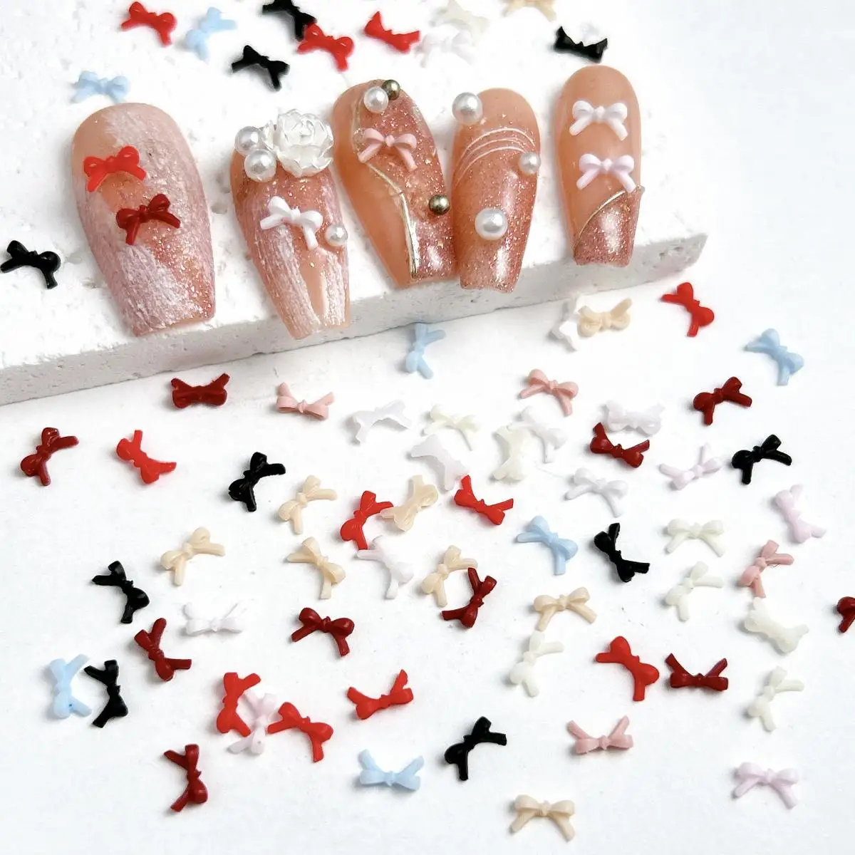 100Pcs 솔리드 컬러 Bowknots 수지 네일 아트 장식 3D 미니 귀여운 라인 활 DIY 헤어 클립 손톱 액세서리에 대 한 네일 매력
