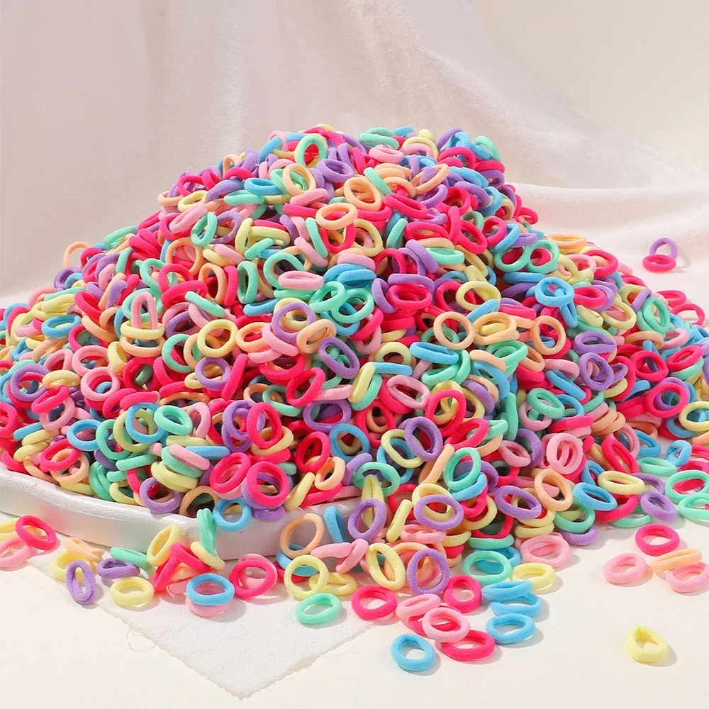 LOVEKIKI 50Pcs 탄성 헤어 밴드 여자 헤어 액세서리 미니 다채로운 나일론 머리띠 키즈 포니 테일 홀더 Scrunchie 장식품 title=LOVEKIKI 50Pcs 탄성 헤어 밴드 여자 헤어 액세서리 미니 다채로운 나일론 머리띠 키즈 포니 테일 홀더 Scrunchie 장식품