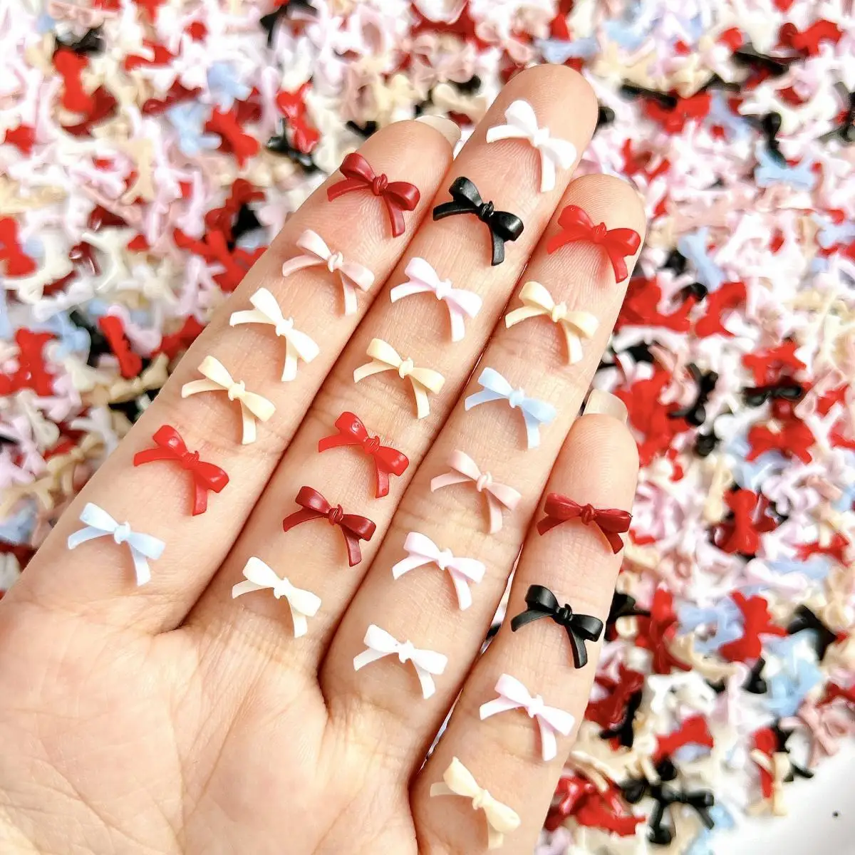 100Pcs 솔리드 컬러 Bowknots 수지 네일 아트 장식 3D 미니 귀여운 라인 활 DIY 헤어 클립 손톱 액세서리에 대 한 네일 매력