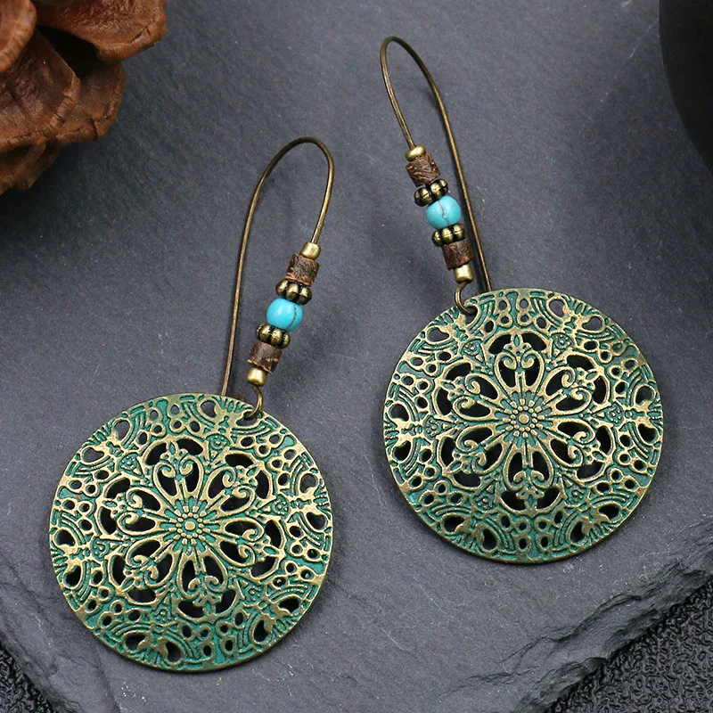 민족 빈티지 보헤미아 여성을위한 큰 귀고리 드롭 귀걸이 기하학 잎 날개 꽃 중공 라운드 Boho Earings 골동품 보석 title=민족 빈티지 보헤미아 여성을위한 큰 귀고리 드롭 귀걸이 기하학 잎 날개 꽃 중공 라운드 Boho Earings 골동품 보석
